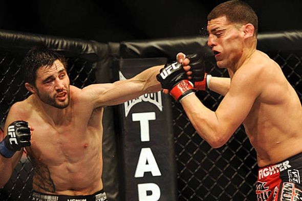 Condit-punches-Diaz-UFC-143-photo.jpg